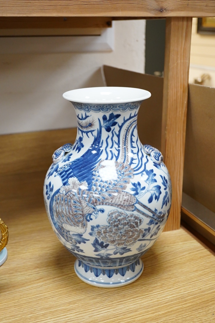 A Chinese underglaze blue and copper red baluster vase, 32cm high